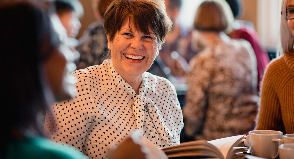 image of a woman at a book group