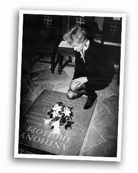 Joanna Trollope in front of the Trollope memorial stone in Westminster Abbey